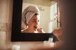 © Malambo/peopleimages.com - Mirror, happy woman and brushing teeth for dental wellness, oral care and hygiene in home. Reflection, cleaning and girl with toothbrush for morning routine, gum health and fresh breath in bathroom