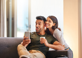 Poster - Relax, selfie and couple in living room, tongue out and bonding with photography, silly and fun in home. Goofy, woman and man with humor, crazy and picture of moment, memory and smile in house