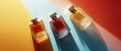 © MacAttack Creations - three glass perfume bottles on colorful background