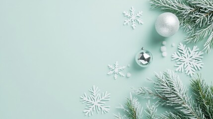 Poster - A soft mint backdrop showcases festive winter elements like silver ornaments, white snowflakes, and pine branches, creating a serene and cheerful holiday vibe for decorations.