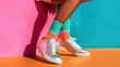©  Shomixer - Emerging from a vivid backdrop, eye-catching silver sneakers and colorful socks showcase bold, carefree style, creating a vibrant and modern visual experience.