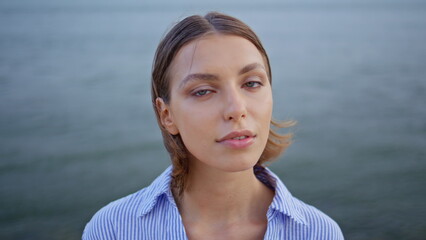 Portrait model standing sea feeling calm. Relaxed brunette enjoy nature serenity