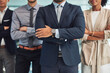 © SometimesNever/peopleimages.com - Business people, confidence and crossed arms for leadership, collaboration and success in office. Lawyer, attorney and legal team for partnership, advocate and justice system in law firm with pride