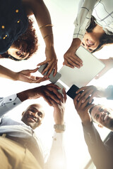 Canvas Print - Business people, hands and tech for team huddle, campaign project and research media trend. Employees, meeting and review feedback on audience engagement, office and connect for news in low angle