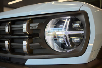 Close up of a cars headlight, part of automotive design