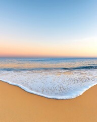 Wall Mural - tranquil waves gently lapping against a serene beach at sunrise capturing the essence of nature's be