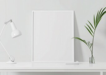 Minimalistic home office desk workspace with blank white frame mockup, lamp and palm plant decoration on white background