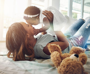 love, black woman and baby bonding on floor with kiss and happiness playing together in living room.