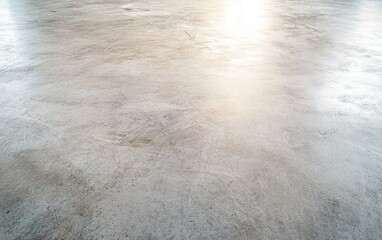 Poster - polished concrete floor reflecting natural light in an empty industrial space during daylight hours