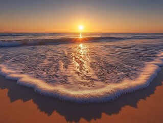 Wall Mural - The sun dipping below the horizon casting long shadows on the beach as the waves gently roll onto the shore