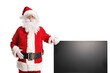 © Ljupco Smokovski - Santa claus with a flad lcd tv screen