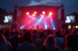 © yuntunen - Blurred background of outdoor festival or music concert. Crowd enjoyment, live performance, or cultural event. Entertainment, leisure, or nightlife concept