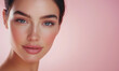 © Kevin Johansson - A brunette model with posing for a camera in a skincare commercial, against a pink background