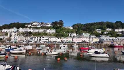 Wall Mural - Looe Cornwall England UK. 30.09.2024. Video.   Looe River looking towards East Looe  fishing port Cornwall  UK.