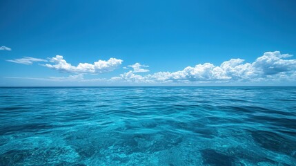 Poster - Experience the serenity of a  blue sea and clear skies, ideal for a relaxing beach vacation.