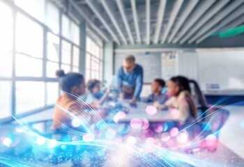 A blurry image of a classroom setting with a teacher and students, with bokeh and bright lights.