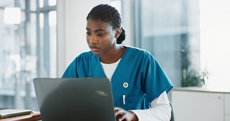 Poster - Hospital, doctor and black woman with laptop, typing and thinking with research, online reading and network. African person, medical or professional with computer, nurse and digital app with internet
