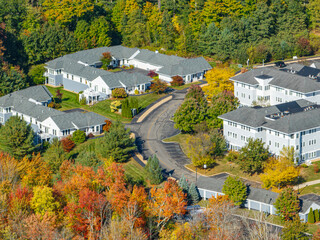 Wall Mural - aerial view of residential apartment community in autumn season