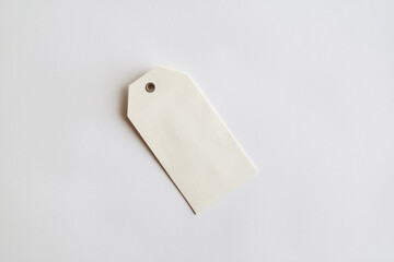 White clothing hang tag mockup blank paper cardboard price label tag with rope with sopy space