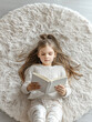 © IBEX.Media - A young girl lies on a round, fluffy white rug, engrossed in reading a book, creating a peaceful and cozy atmosphere that emphasizes comfort, relaxation, and learning