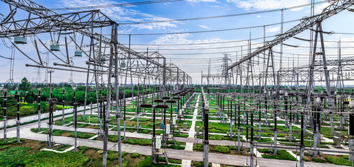 Canvas Print - High voltage substation electricity tower industrial equipment landscape