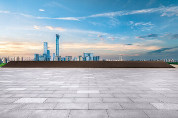 Sticker - Empty floor square and cityscape with skyline in modern city at sunset