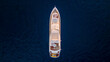 © Amazing Aerial - Aerial view of a luxurious yacht sailing on the serene blue ocean, Baja California Sur, Mexico.