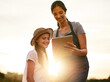 © FotoPush/peopleimages.com - Mother, child and tablet on farm for farming, outdoor agriculture and sun flare for sustainability. Mom, daughter and online for teaching kid in nature, produce development and helping in environment