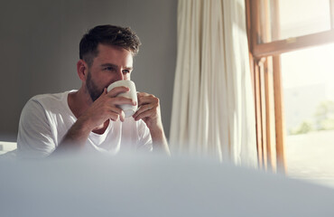 Sticker - Morning, tea and bedroom thinking with man, smile and drinking warm beverage in home bed for weekend. Coffee, relax or espresso with young guy, rest or wake up for routine in house or apartment