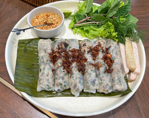 Vietnamese steamed rice rolls and a sweet peanut dipping sauce