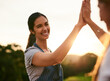 © FotoPush/peopleimages.com - Outdoor, high five and people in farm, smile and success for farming, victory and happy for growth. Agriculture, help and holding hands for celebration, eco friendly and sustainability of environment