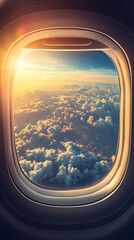 Poster - The sun is shining through the airplane window, illuminating the clouds below with golden light, creating a breathtaking view for passengers
