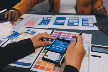 The designer team is designing the uxui system to make the uxui system work well on new phones and support system updates. Website development concept UI UX front end designer