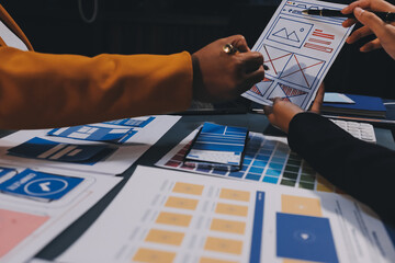 The designer team is designing the uxui system to make the uxui system work well on new phones and support system updates. Website development concept UI UX front end designer