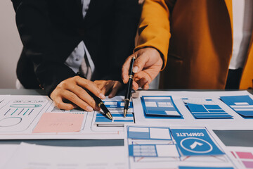 The designer team is designing the uxui system to make the uxui system work well on new phones and support system updates. Website development concept UI UX front end designer