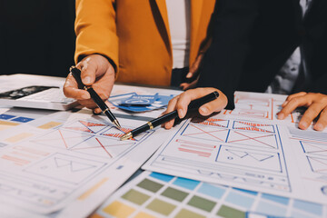 The designer team is designing the uxui system to make the uxui system work well on new phones and support system updates. Website development concept UI UX front end designer