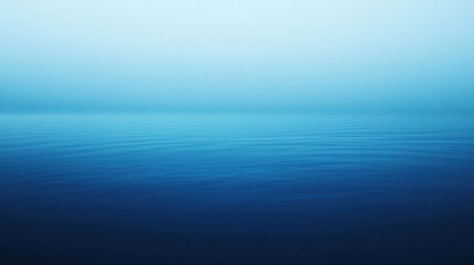Fototapete - serene blue gradient background that transitions from a deep navy at the top to a soft sky blue at the bottom.