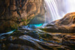 © Travel 'n' Lifestyle - View of a breathtaking waterfall cascading over rugged rocks in Cauterets, France.