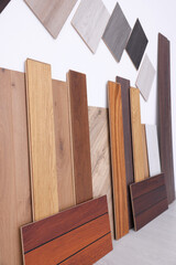 Canvas Print - Many different samples of wooden flooring on light background