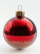 © Bundi - Wintertime red Christmas ball New Year's Eve bauble hanging ornament classic. Traditional winter holiday home decoration. Merry Christmas event symbol.