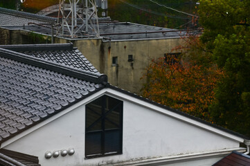 The rooftop of Japanese house, traditional Japanese house rooftop. Tile roof in Japan. Building exterior. Travel concept.