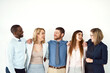 © Koegelenberg Coop/peopleimages.com - Hug, business and people in row at office for job interview, recruitment and hiring on white wall. Employees, candidates and human resources for career opportunity, development and vacancy in smile