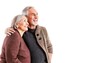 © Chase D’Animulls - Happy older retired married couple. Mature, senior woman and man. In love anniversary concept. Hugging very close to each other.  Isolated on white background with copy space