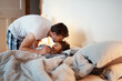 © HockleyM4/peopleimages.com - Relax, kiss and father with child in bedroom at night preparing for sleep together at home. Rest, bonding and dad with boy kid laying in bed for nap with connection, love and care at family house.