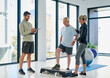 © SensSai/peopleimages.com - Exercise, clipboard and physiotherapist with senior patient for service, consulting or wellness. Chiropractor, healthcare and man and mature dad and woman for physical therapy, rehabilitation or help