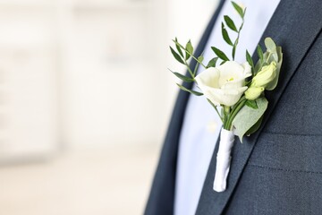 Poster - Groom in suit with stylish boutonniere indoors, closeup. Space for text