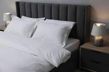 Canvas Print - Bed with clean linens and pillows at home