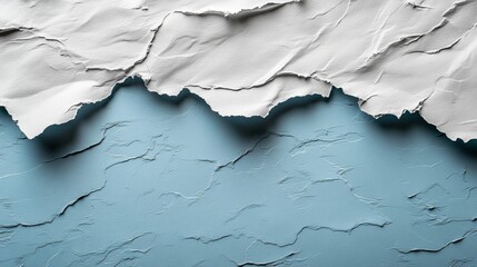 Fototapete - Torn white paper edges create a dynamic contrast against a textured blue background, showcasing the interplay of materials and colors artistically.