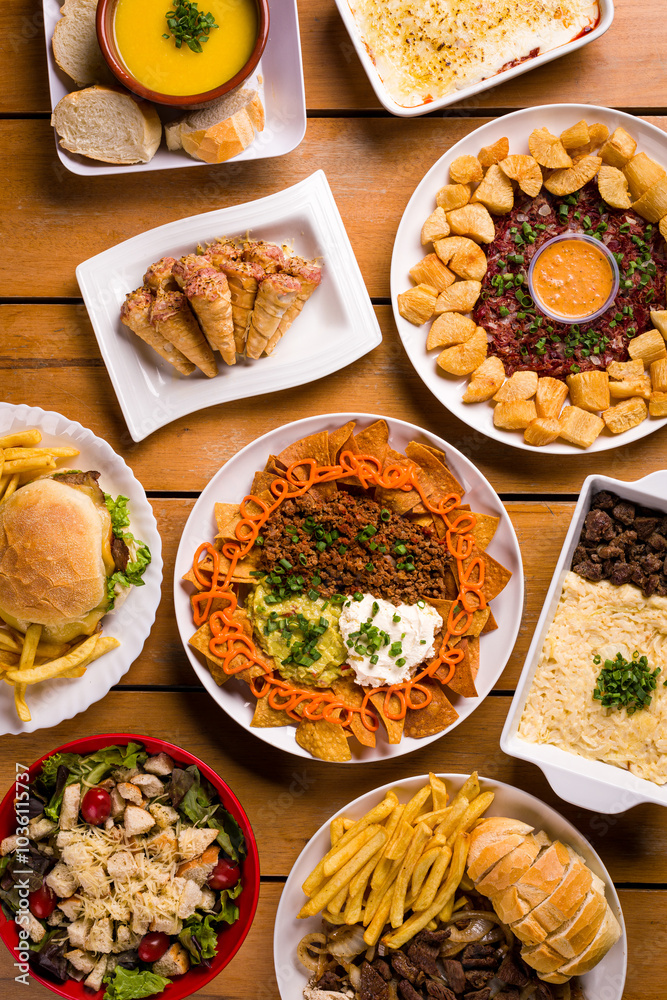 Delicious Variety of Gourmet Dishes on Wooden Table Surface