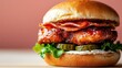 © familymedia - A succulent chicken burger with crispy bacon and crisp pickles sandwiched in a golden bun, offering an explosion of flavors and fulfilling the craving for fast food.